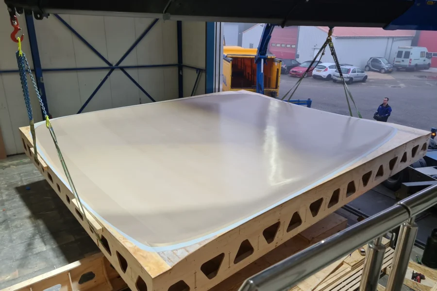 White mould plate on a wooden support frame