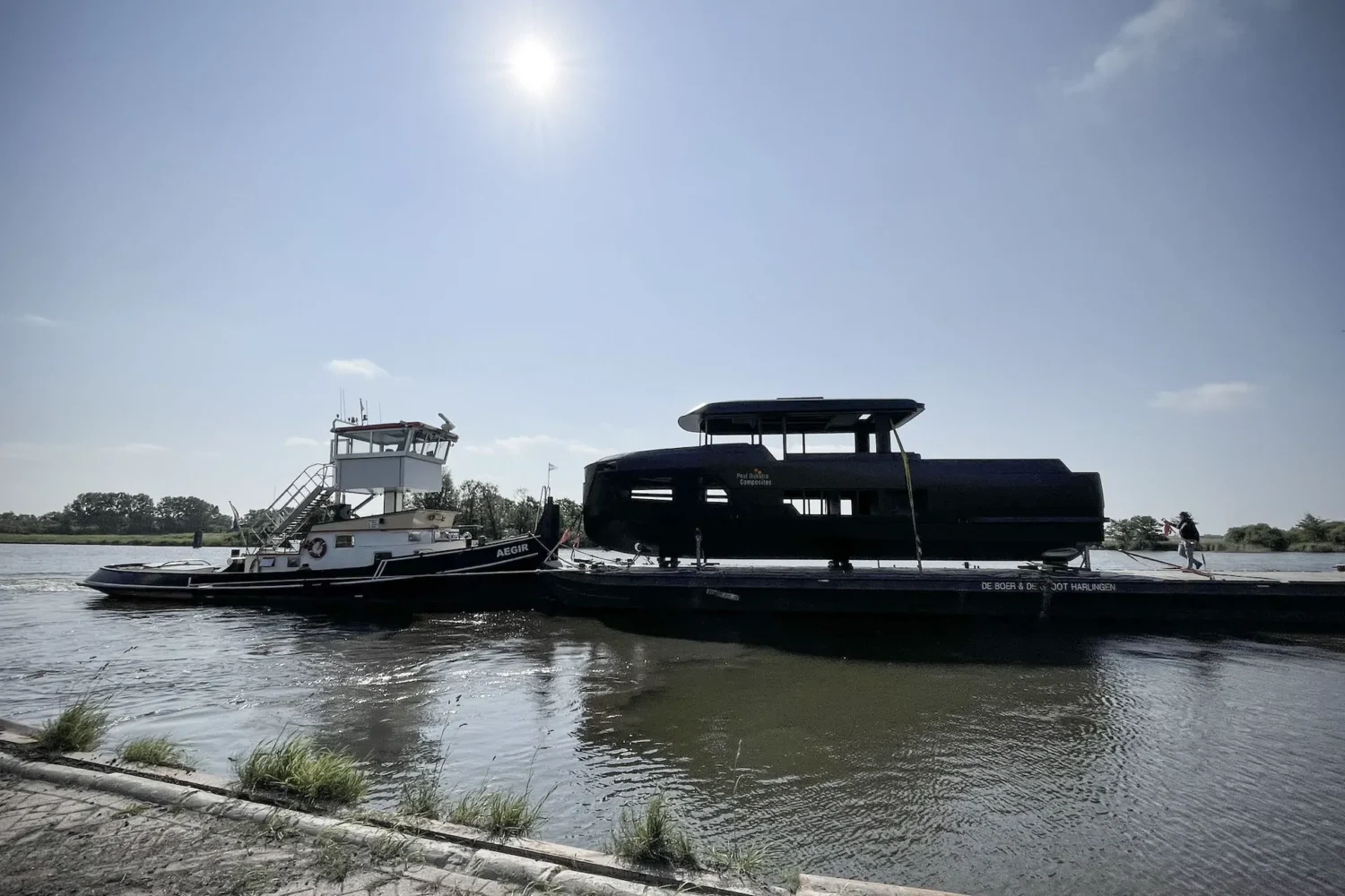 Boat hull being transported by water