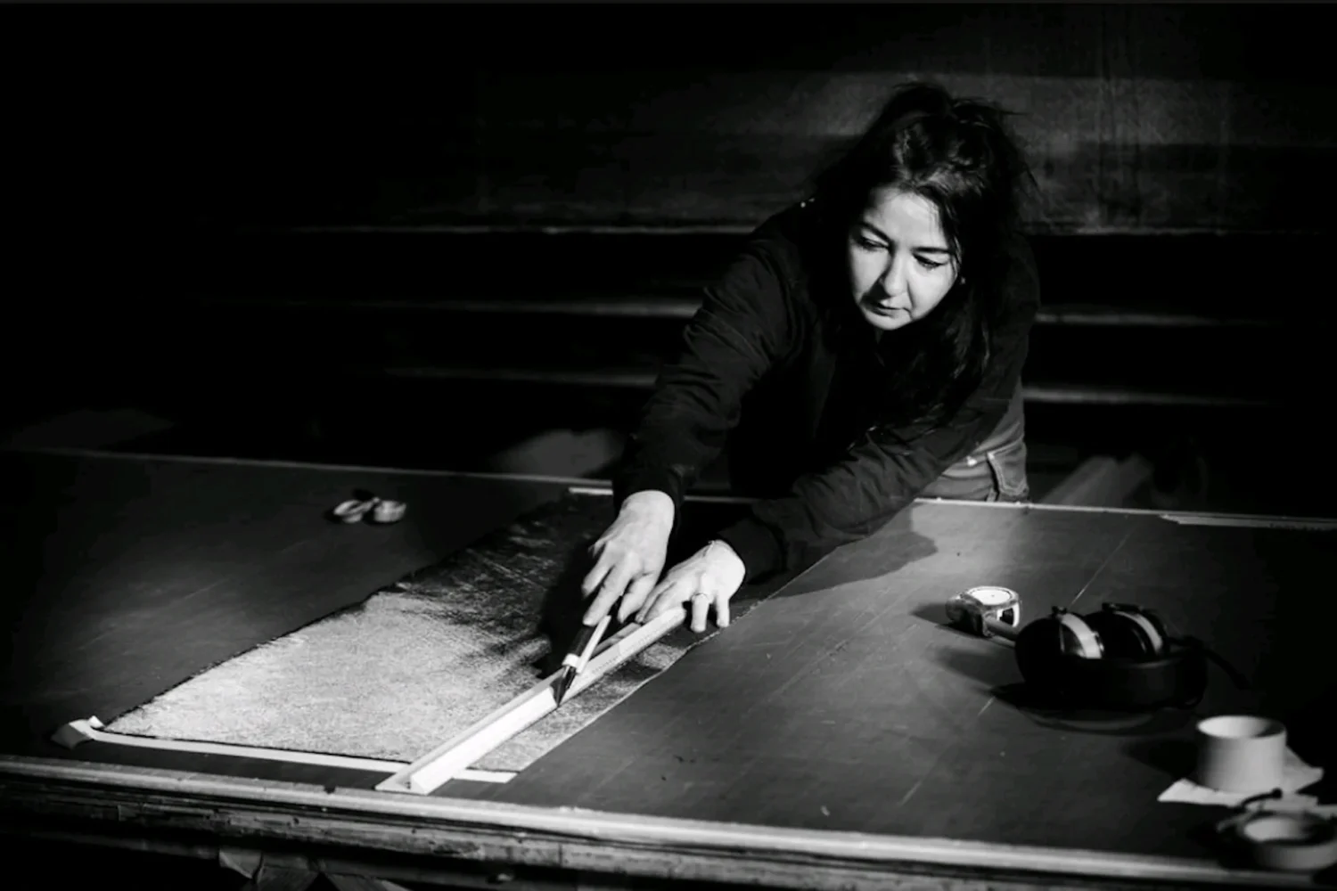 Employee measuring a flat composite panel