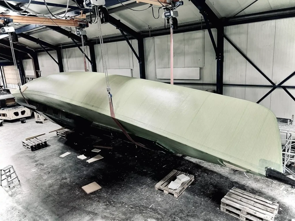 Lightweight boat hull upside down in the workshop