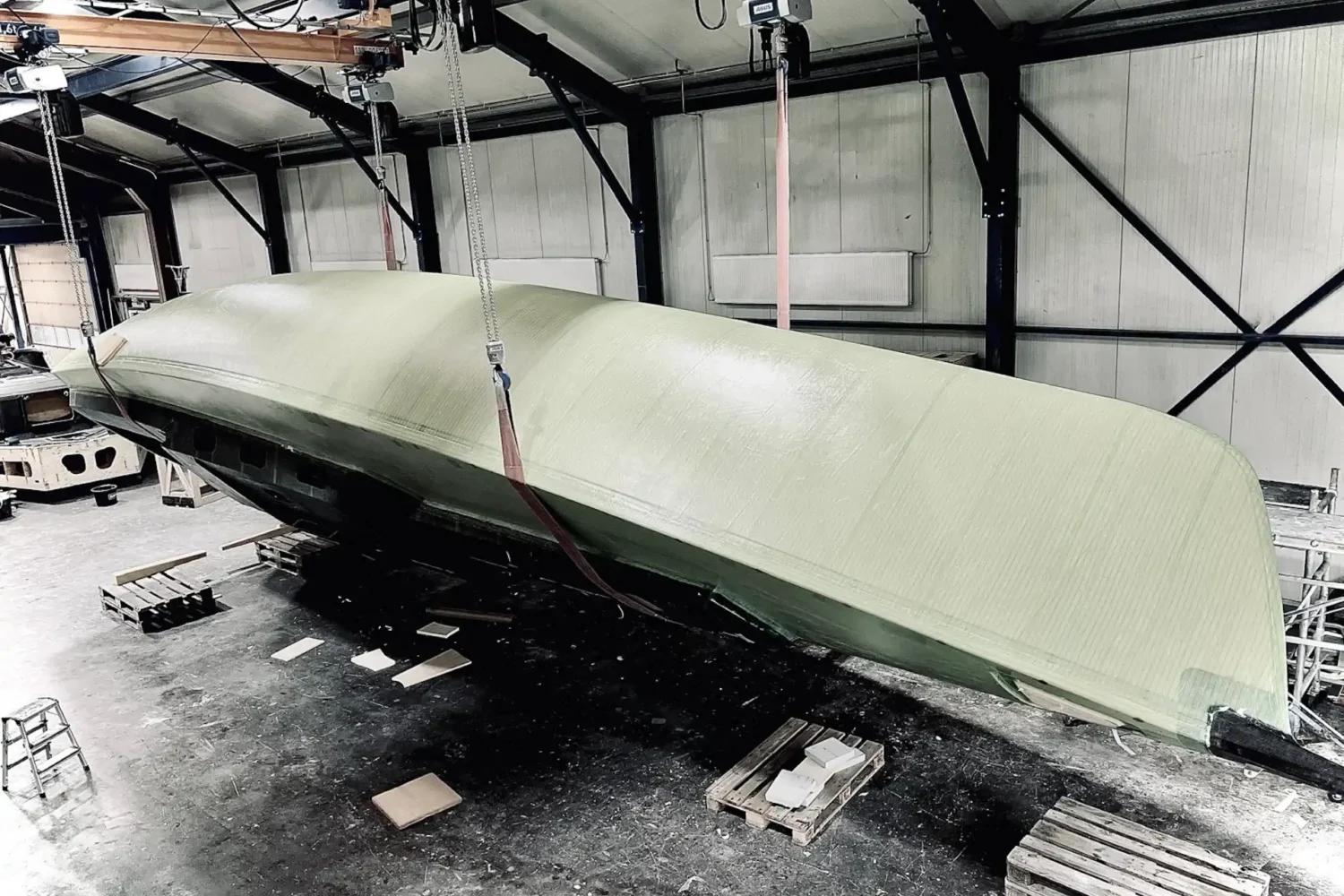Lightweight boat hull upside down in the workshop