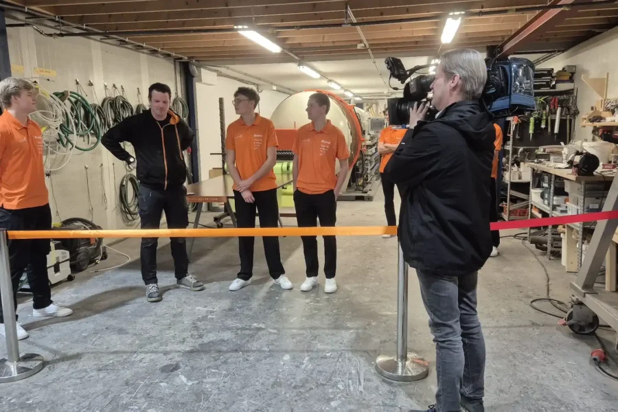 People at the opening of solar car production