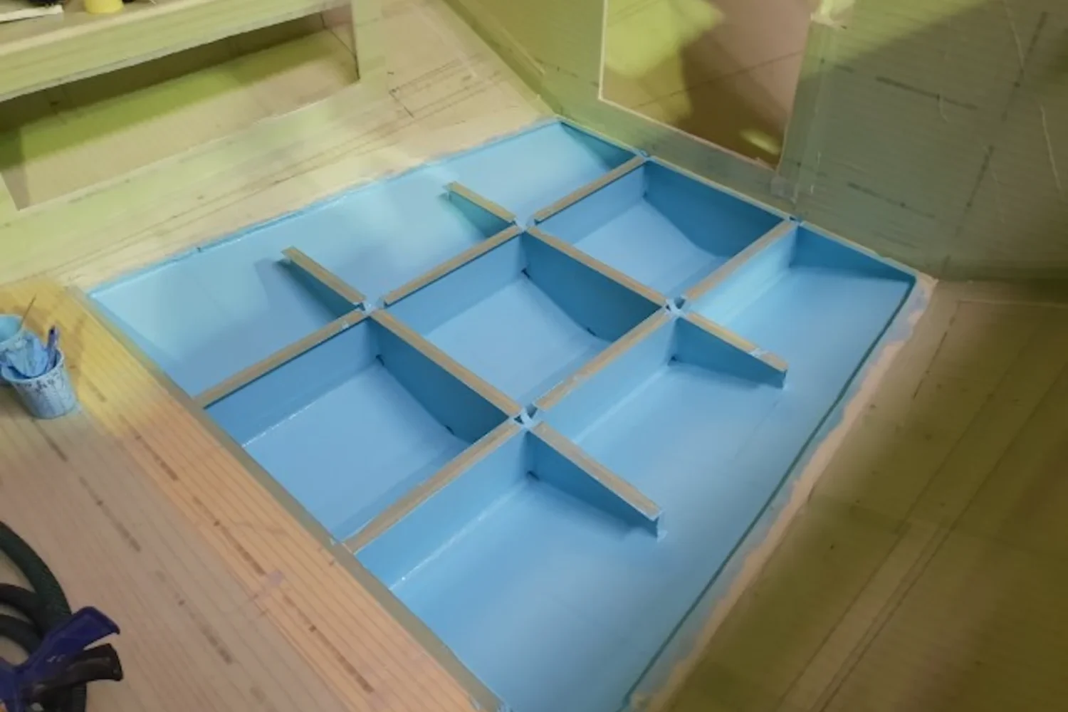 Boat interior structure with a blue protective layer