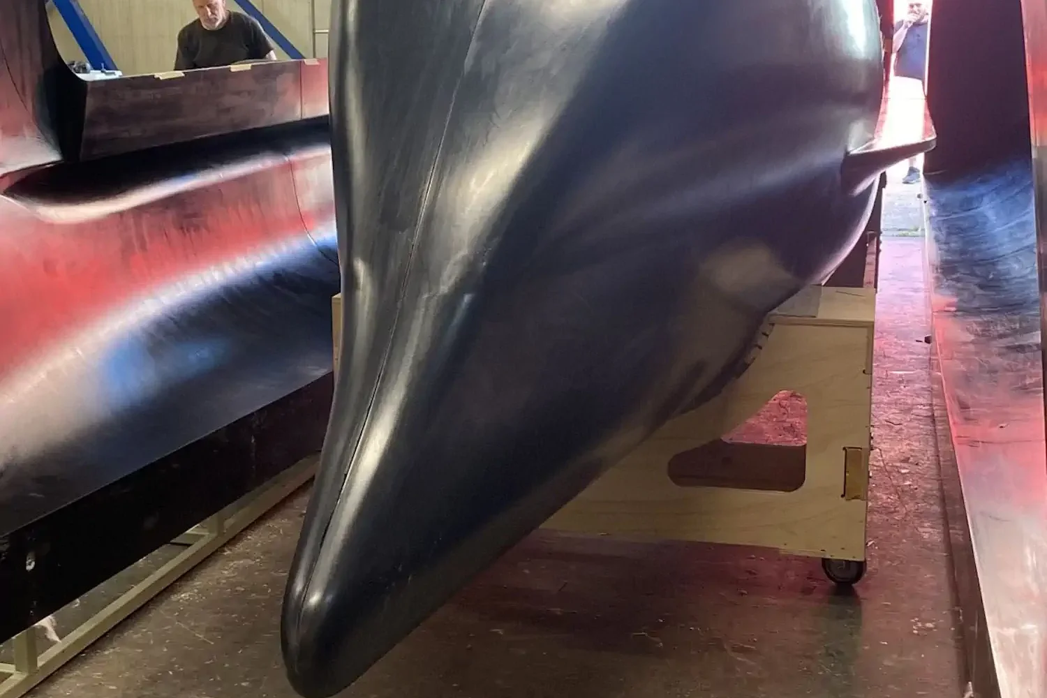 Narrow boat hull on a work stand