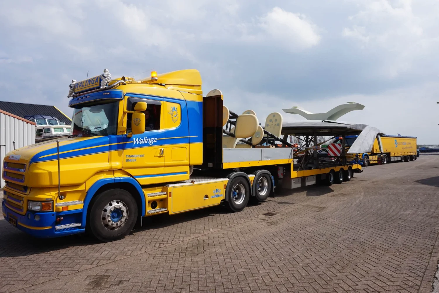 Yacht superstructure on a low-loader