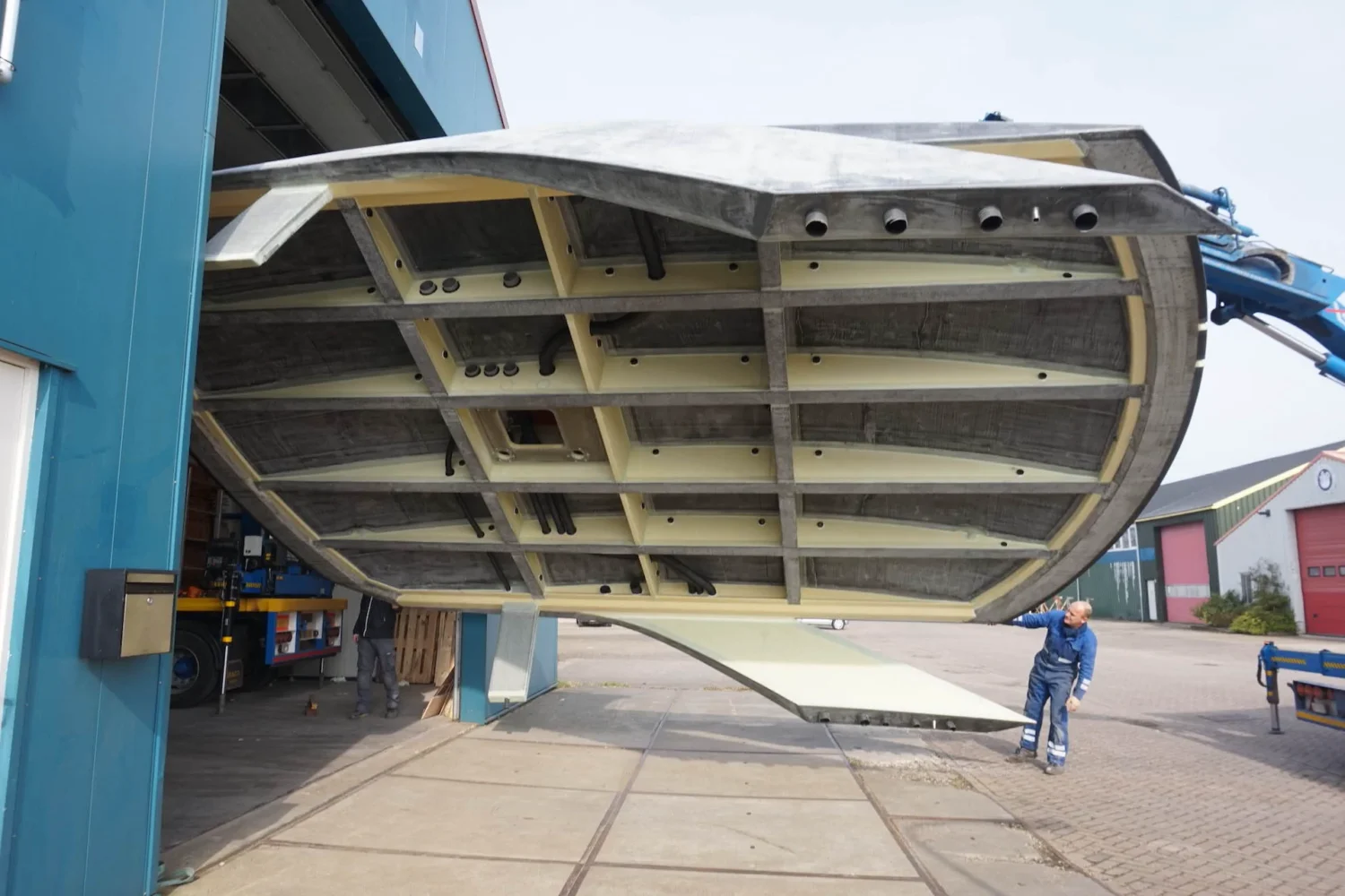 Underside of a yacht superstructure outside the workshop