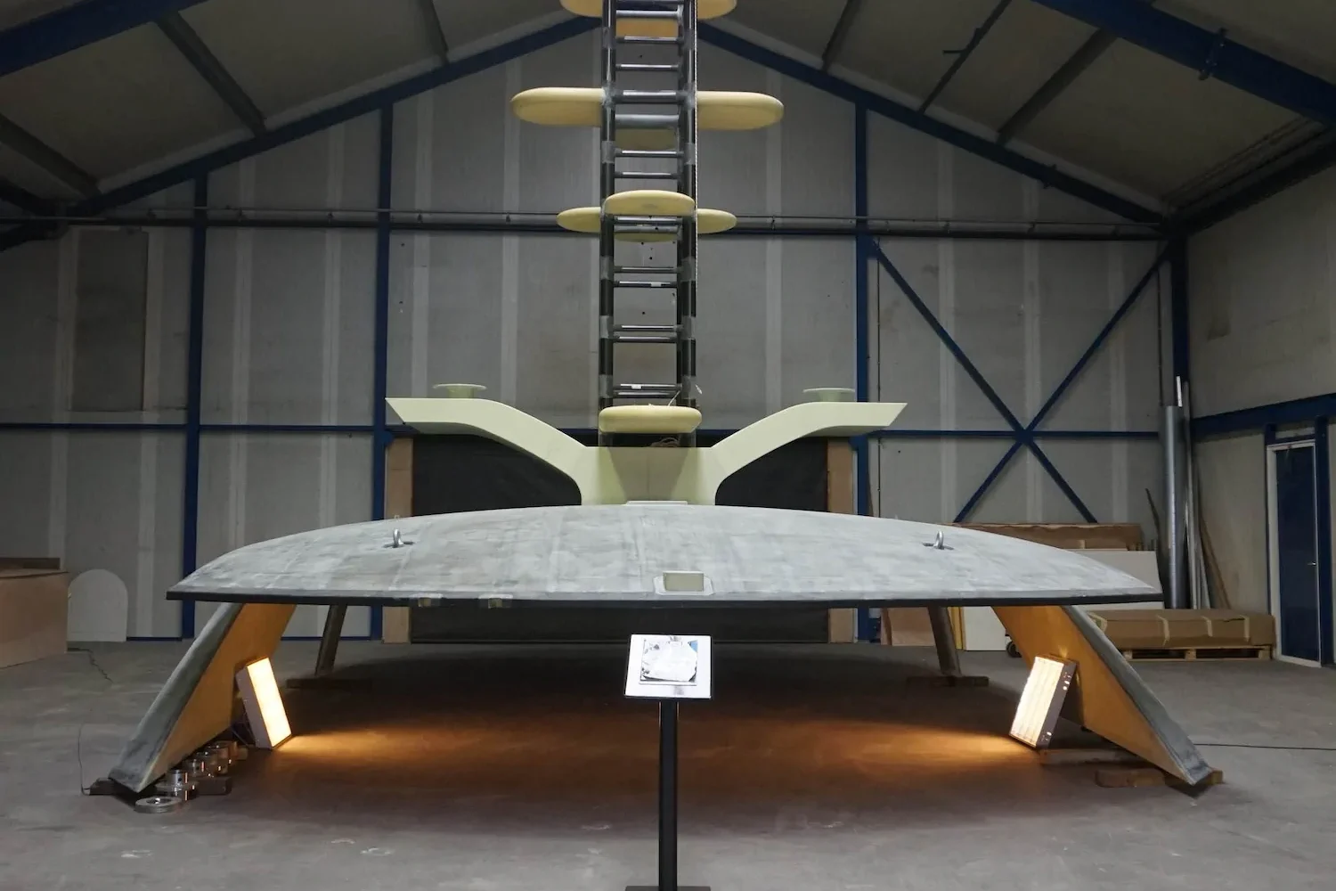 Front view of a boat hull in the workshop
