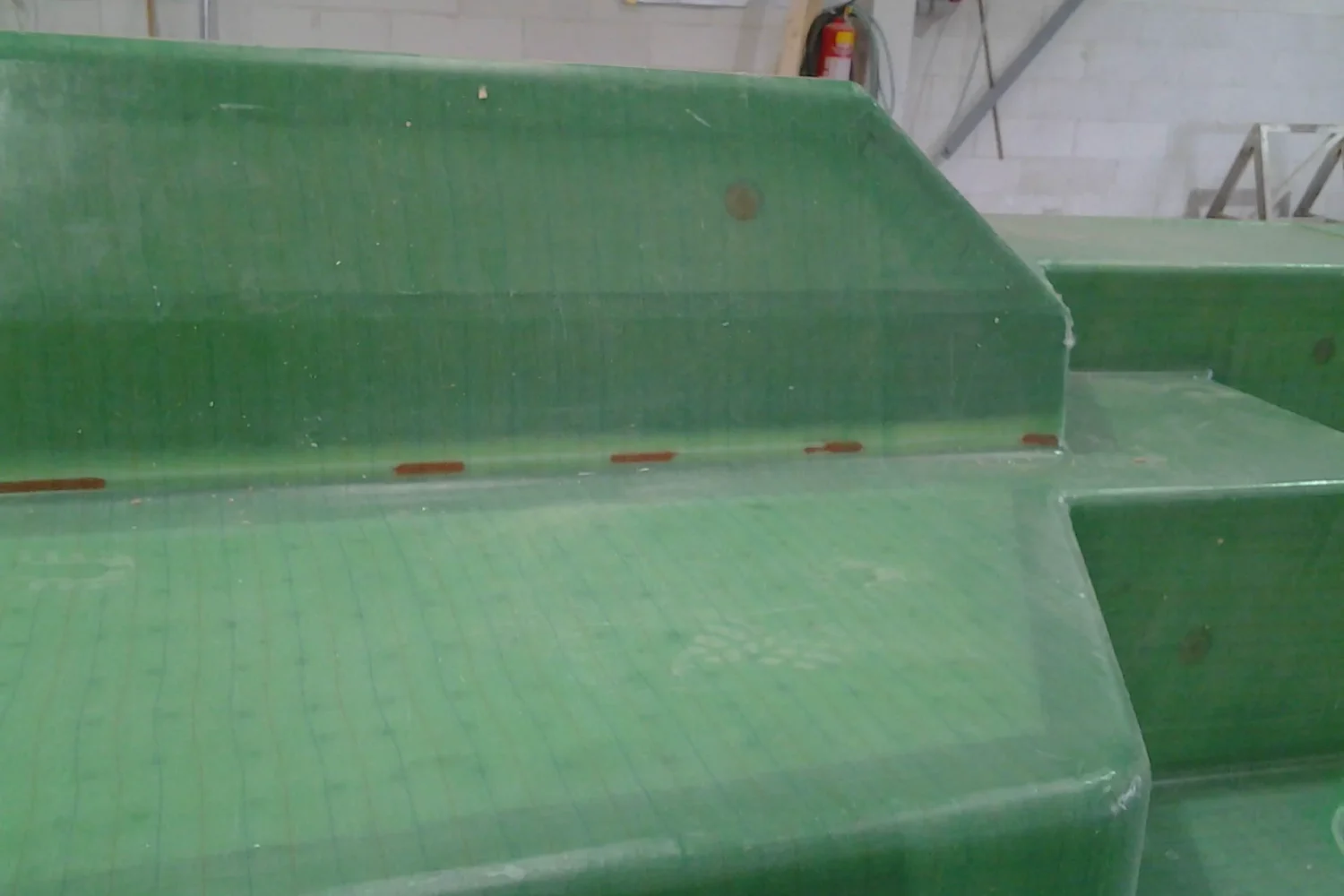 Finished edge of a green composite component