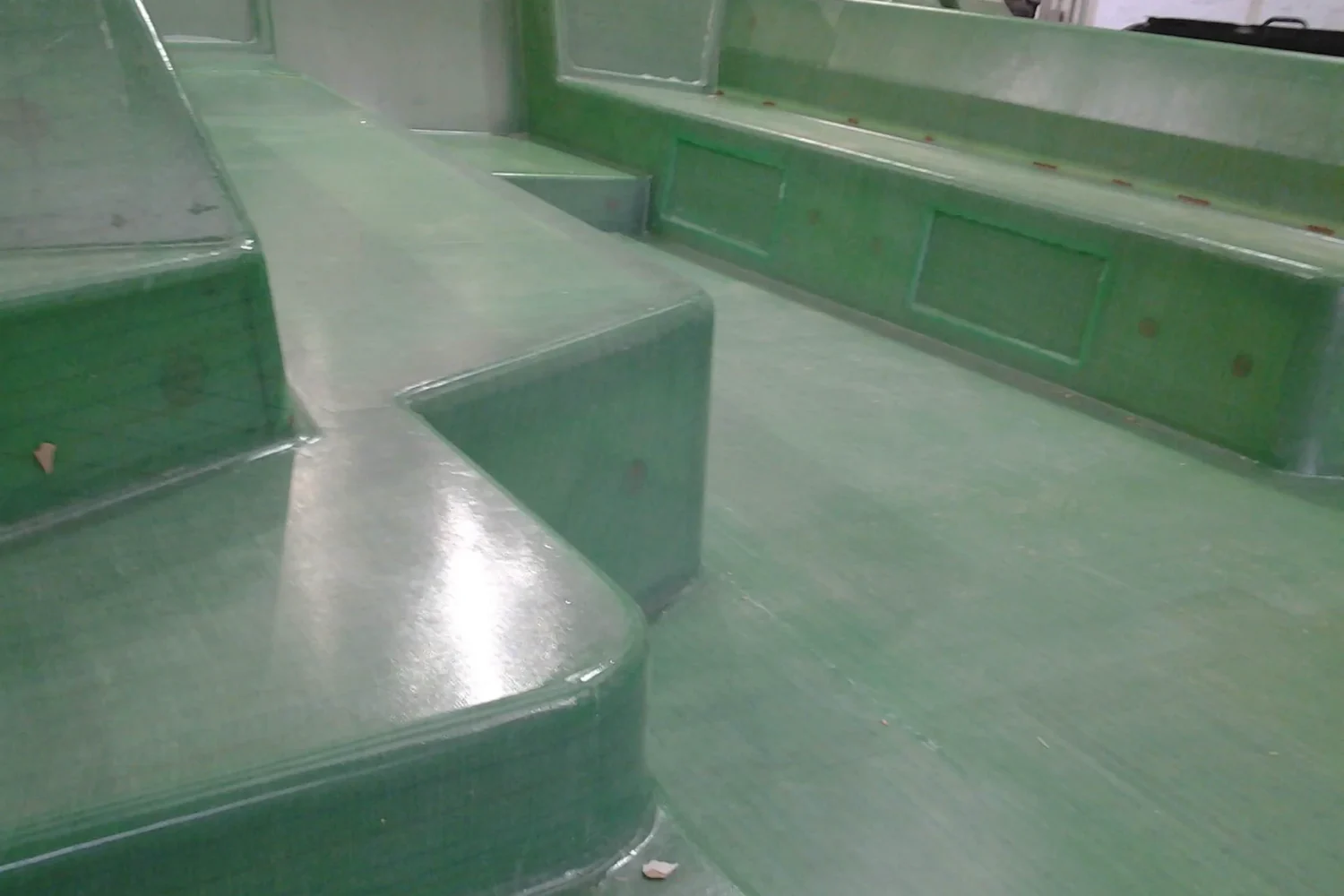 Detail of a green composite structure with a raised edge