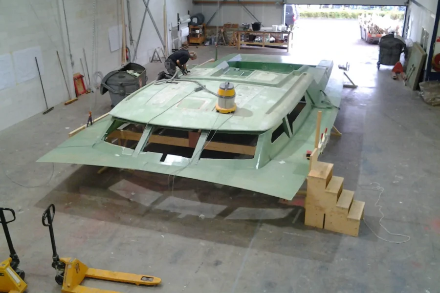 Green yacht superstructure on wooden supports
