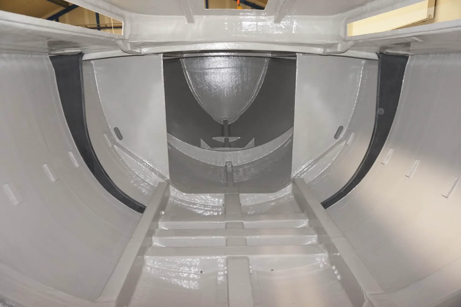 Glossy interior of a boat hull with reinforcements