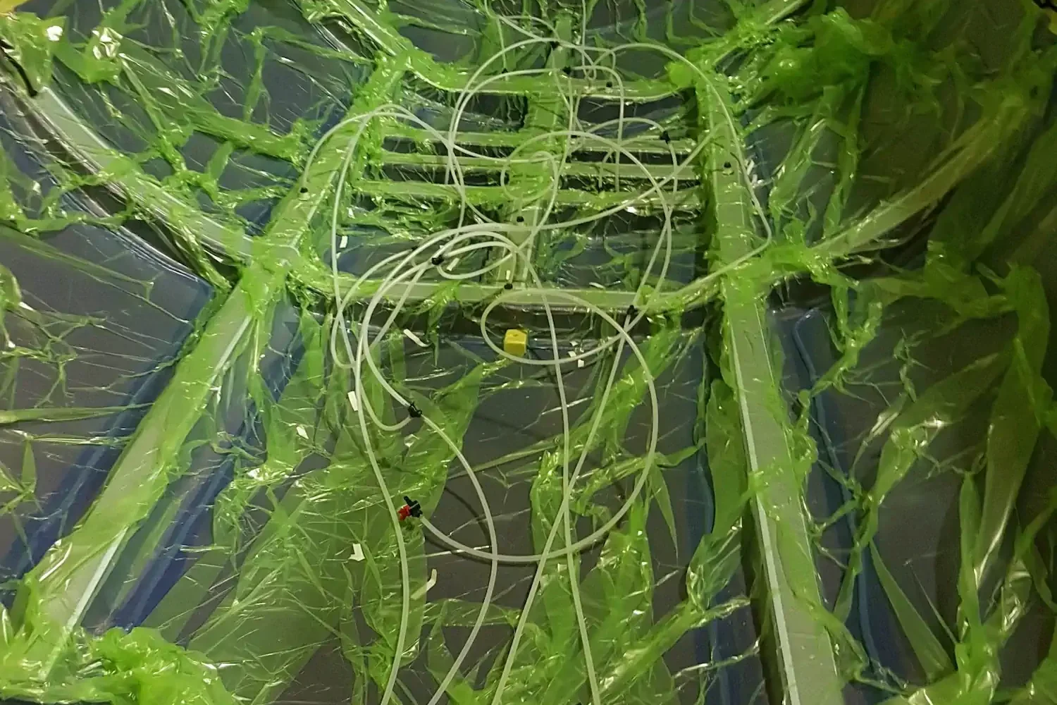Vacuum bagging film around the bow structure