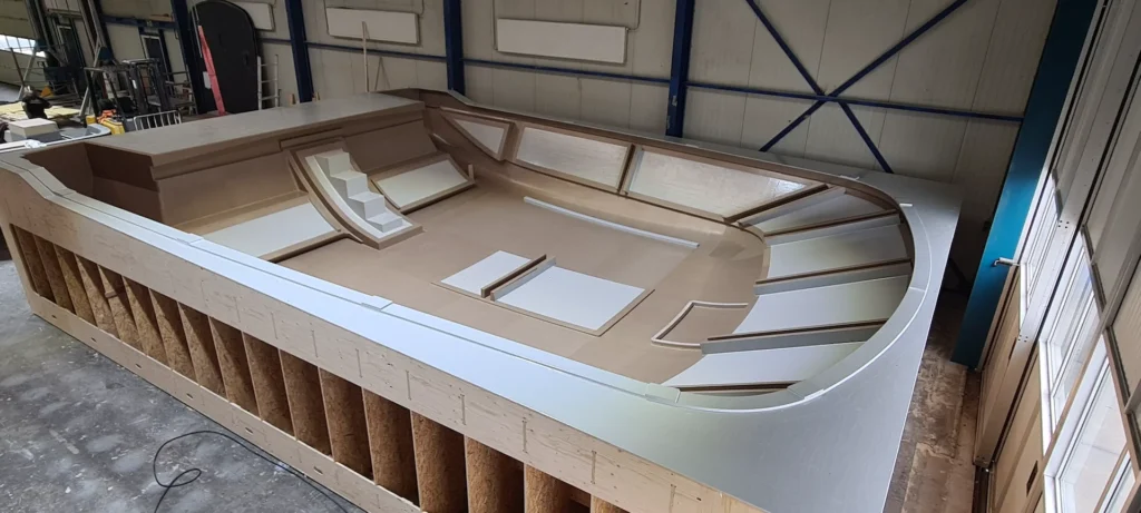 Wooden construction frame with a lightweight boat shape