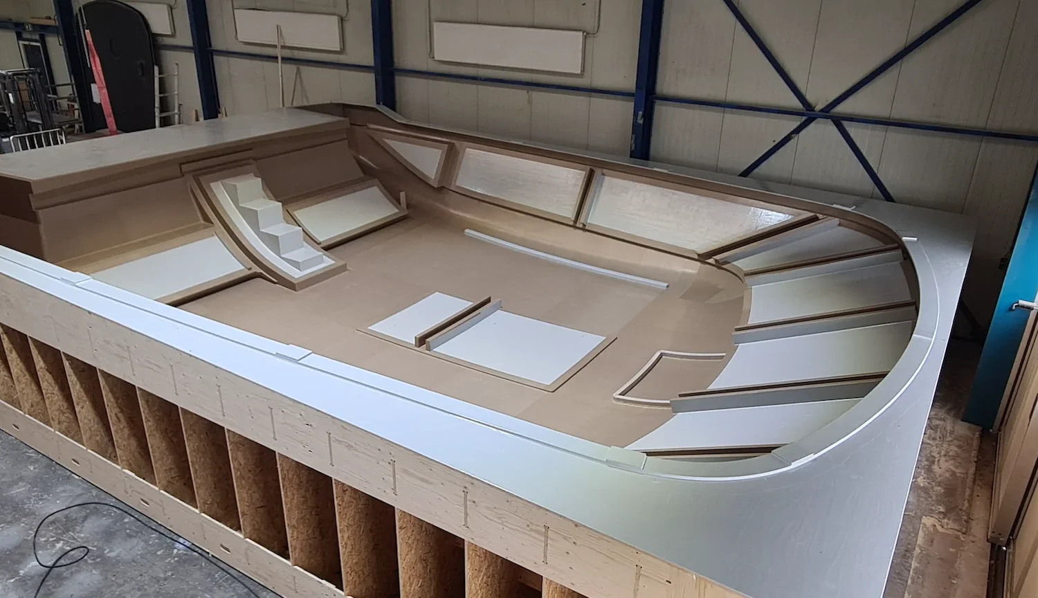 Wooden construction frame with a lightweight boat shape