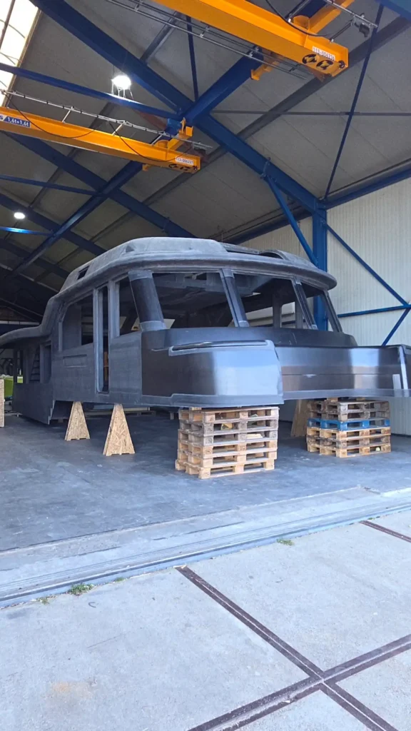 Boat hull on pallets in the workshop