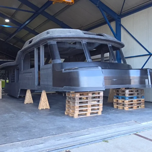 Boat hull on pallets in the workshop