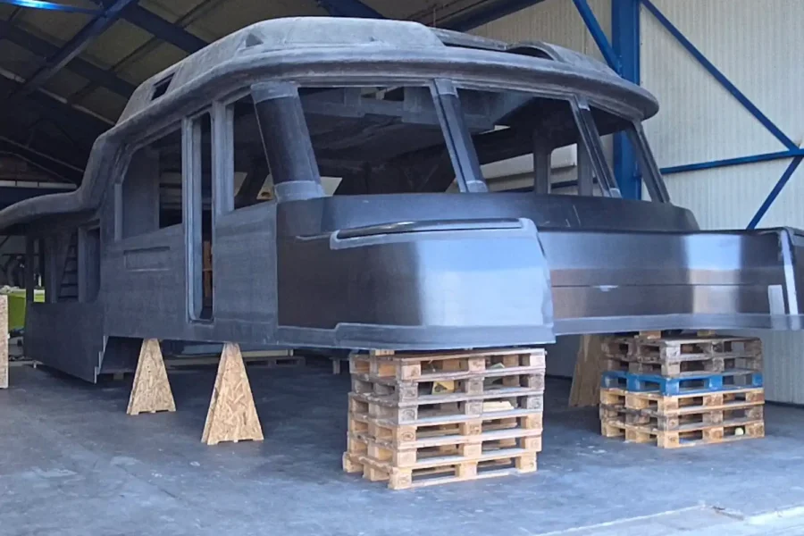 Boat hull on pallets in the workshop