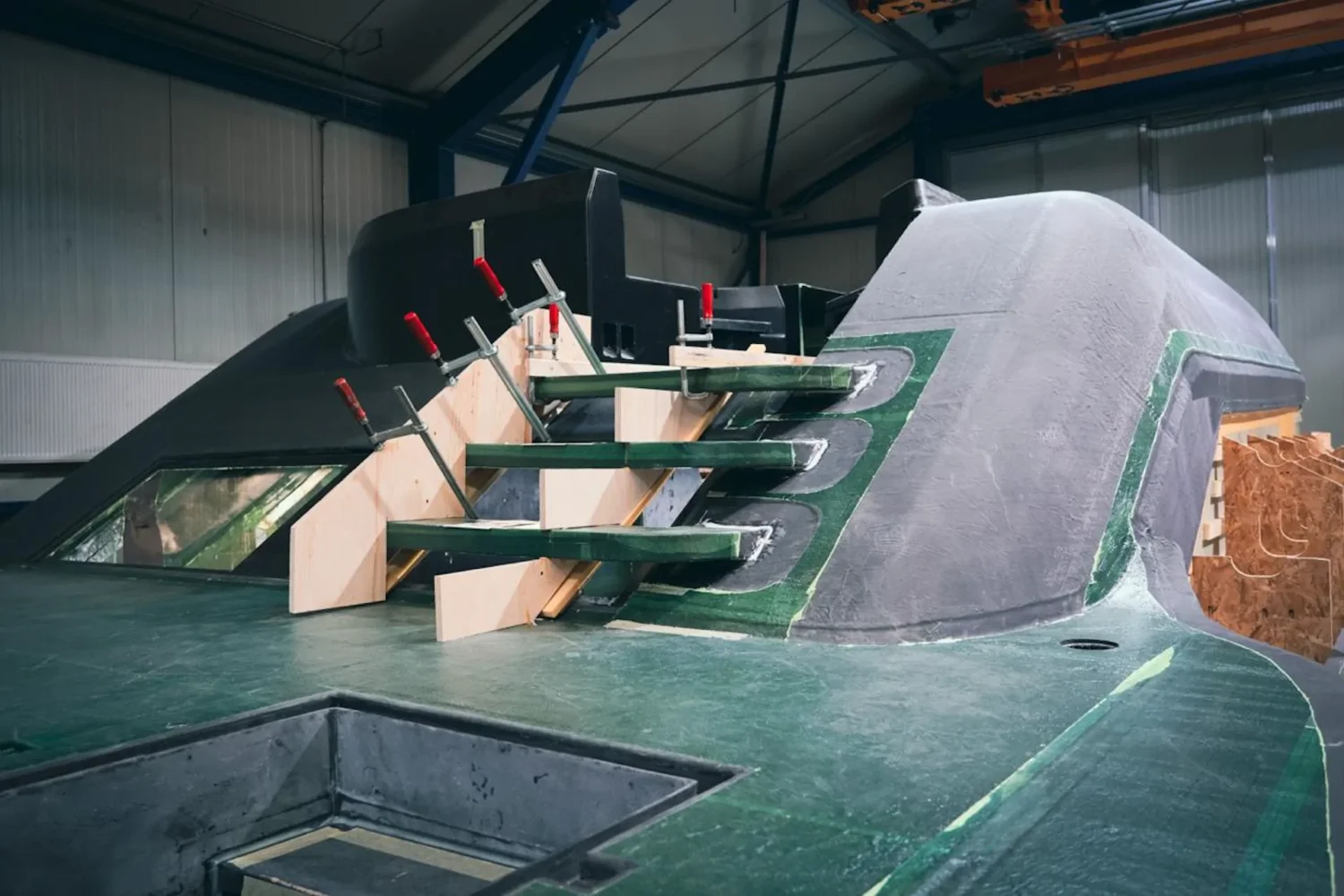Dark yacht superstructure with steps and window openings