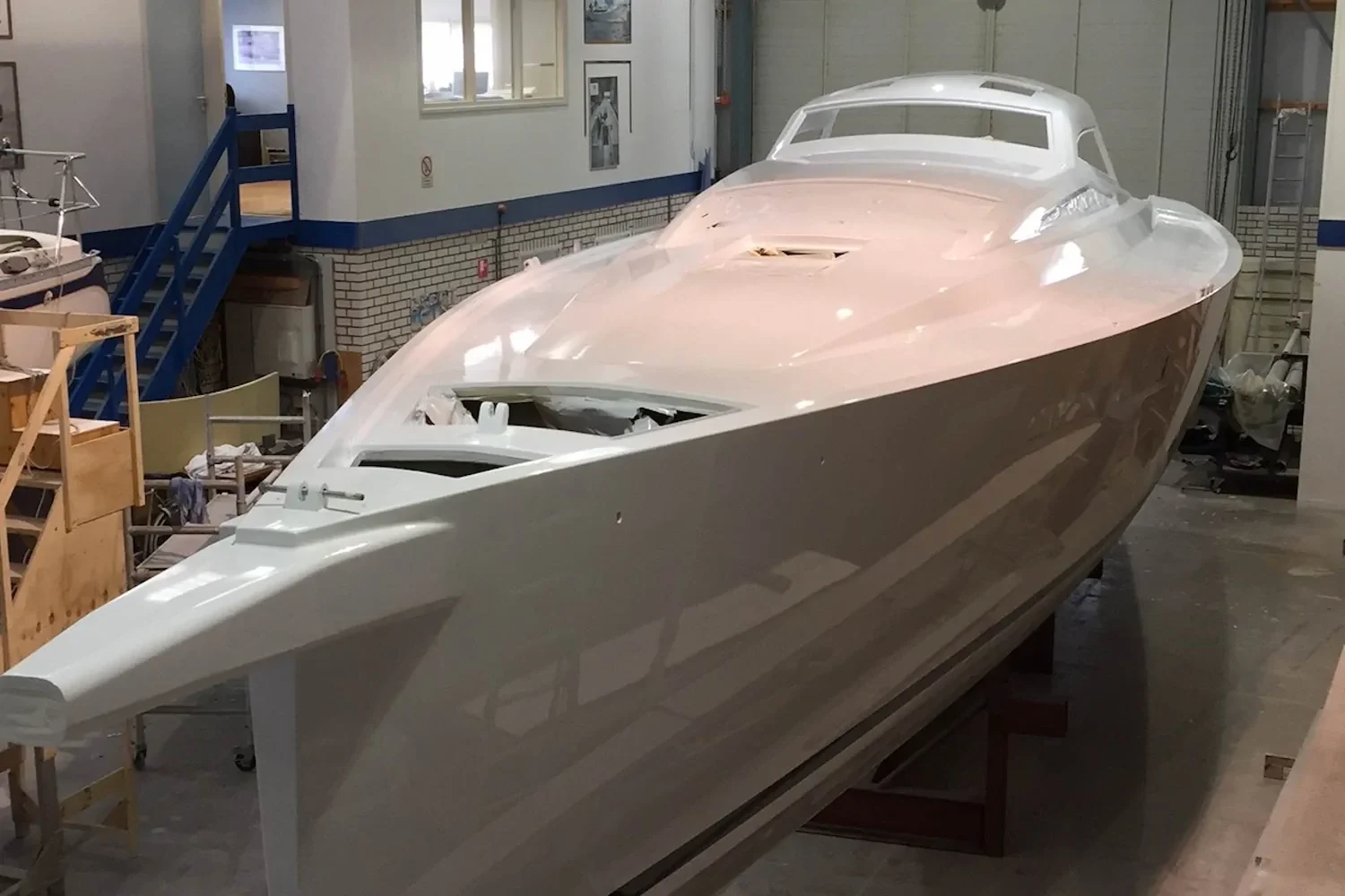 Boat hull on supports in the workshop