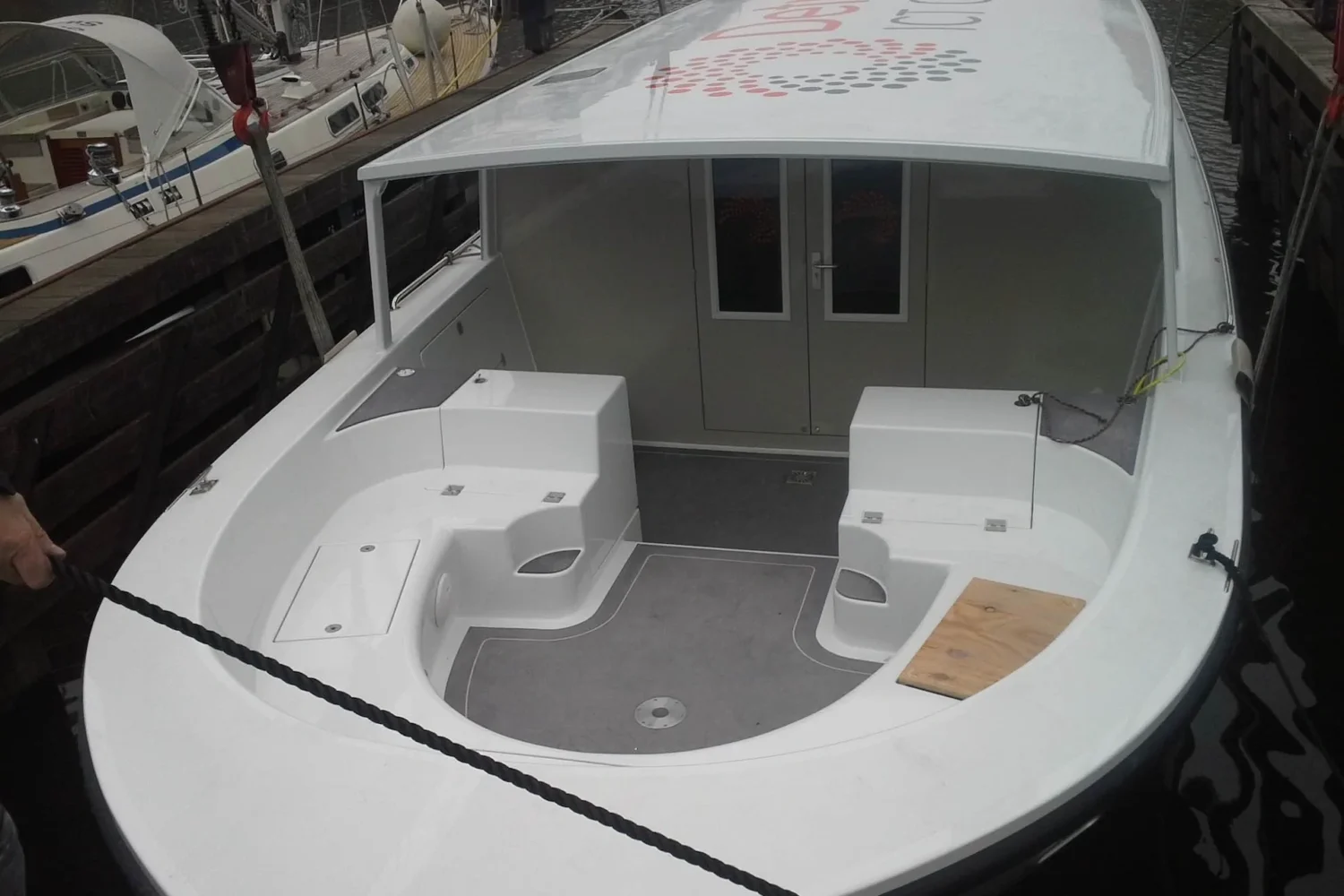 White cockpit and superstructure of a motorboat